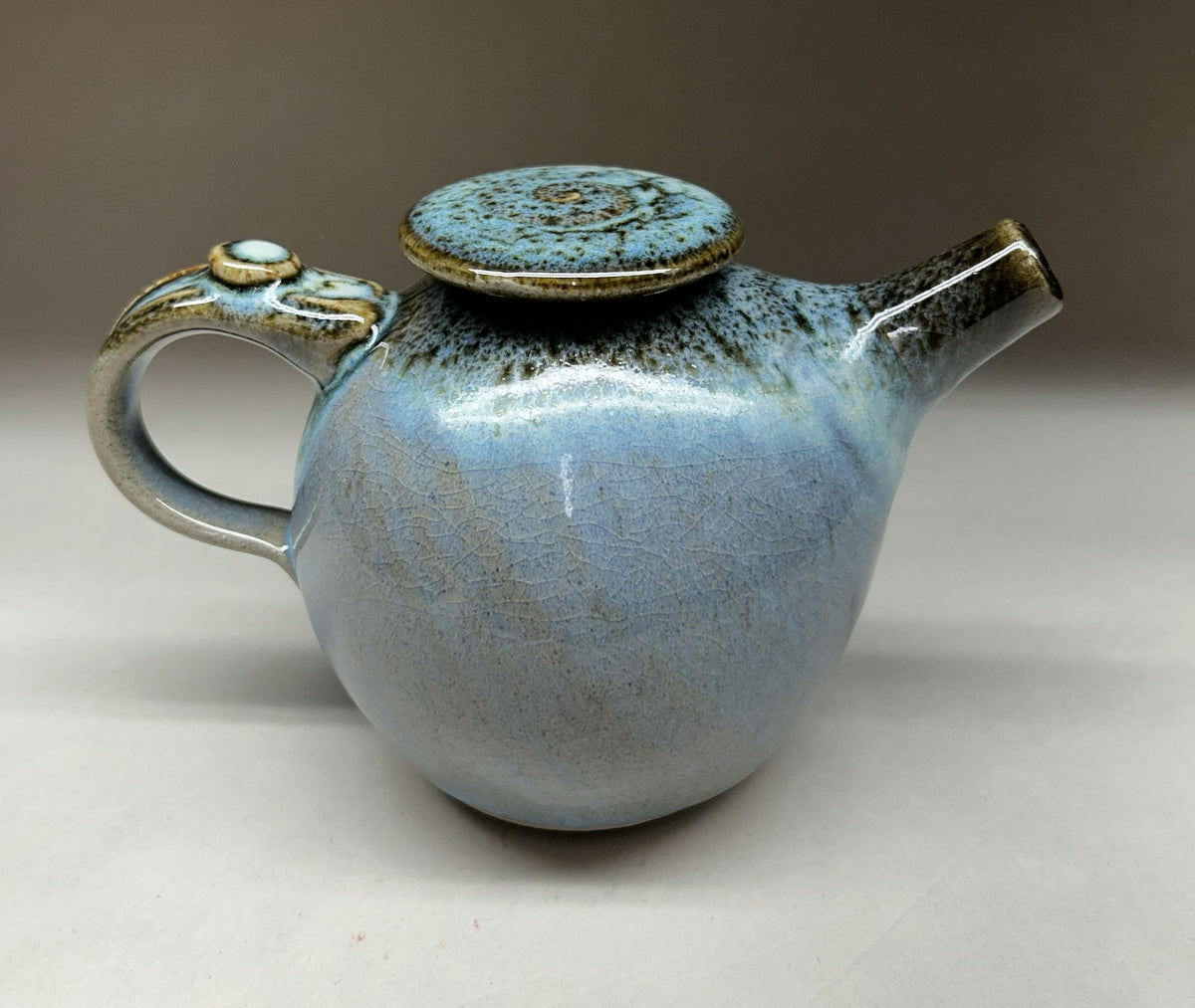 Small Handmade pottery teapot finished in a beautiful Blue Green Ash glaze