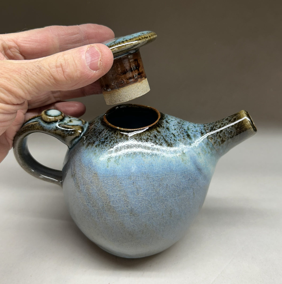 Small Handmade pottery teapot finished in a beautiful Blue Green Ash glaze
