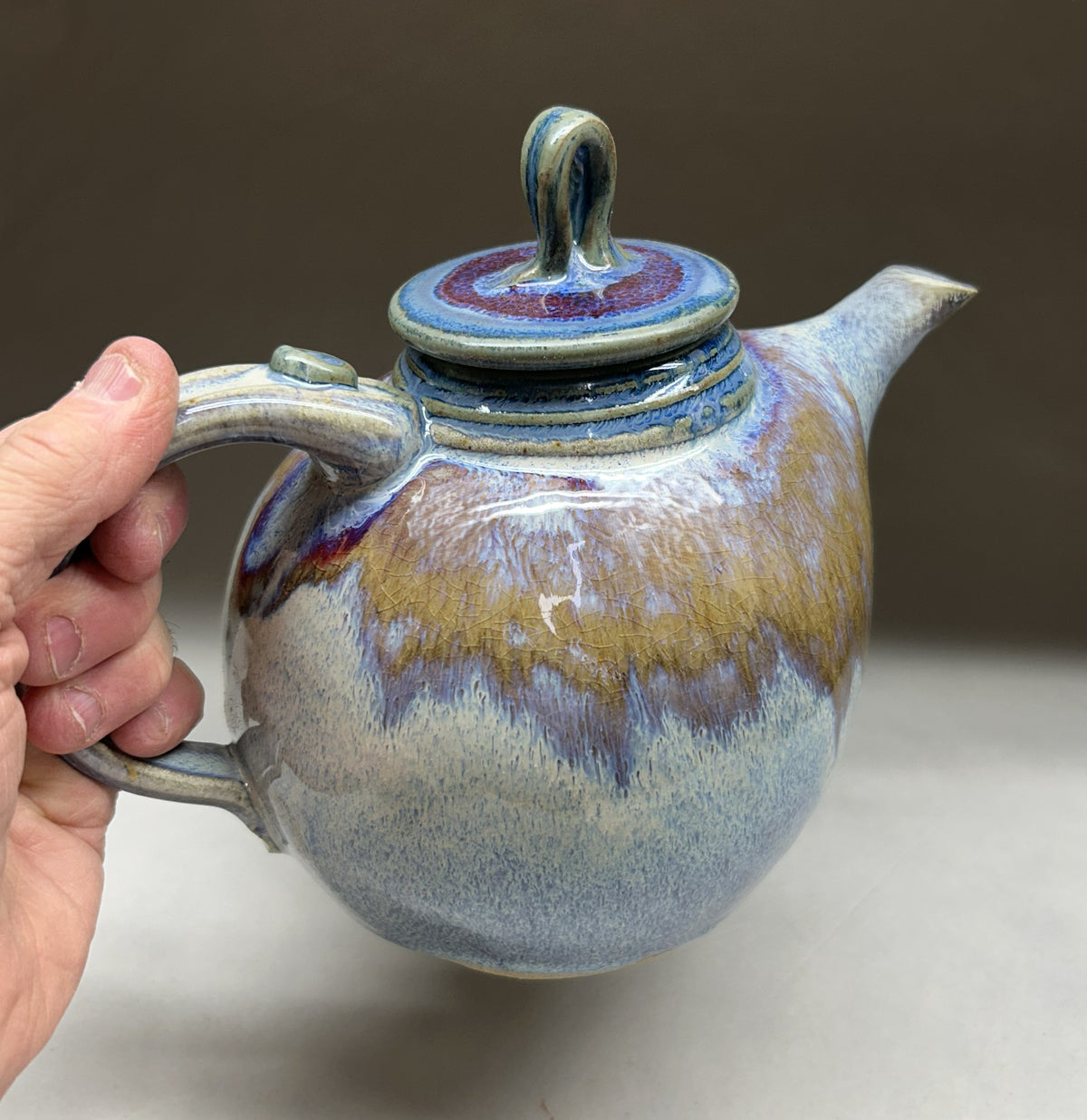 Handmade pottery teapot finished in a vibrant Electric Blue glaze