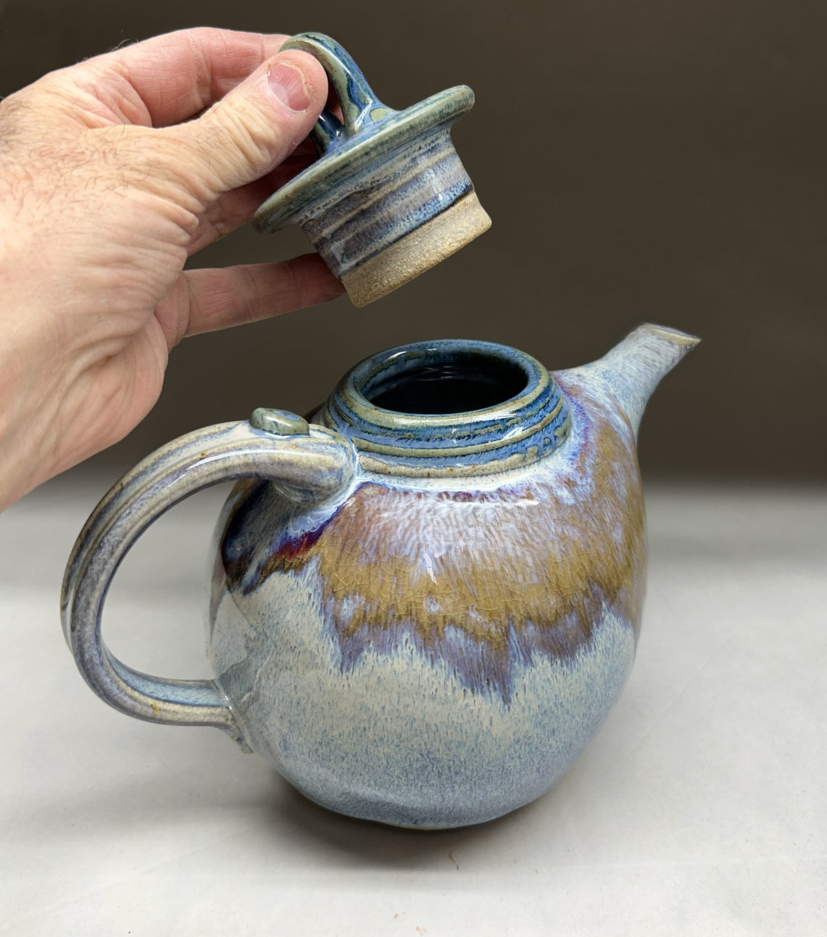 Handmade pottery teapot finished in a vibrant Electric Blue glaze