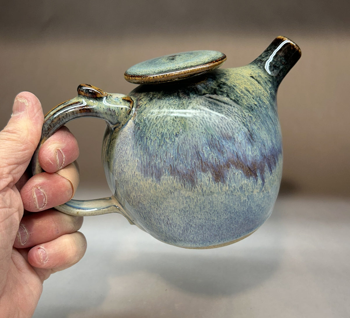 Small Handmade pottery teapot finished in a beautiful Rutile Blue &Temoku Glaze